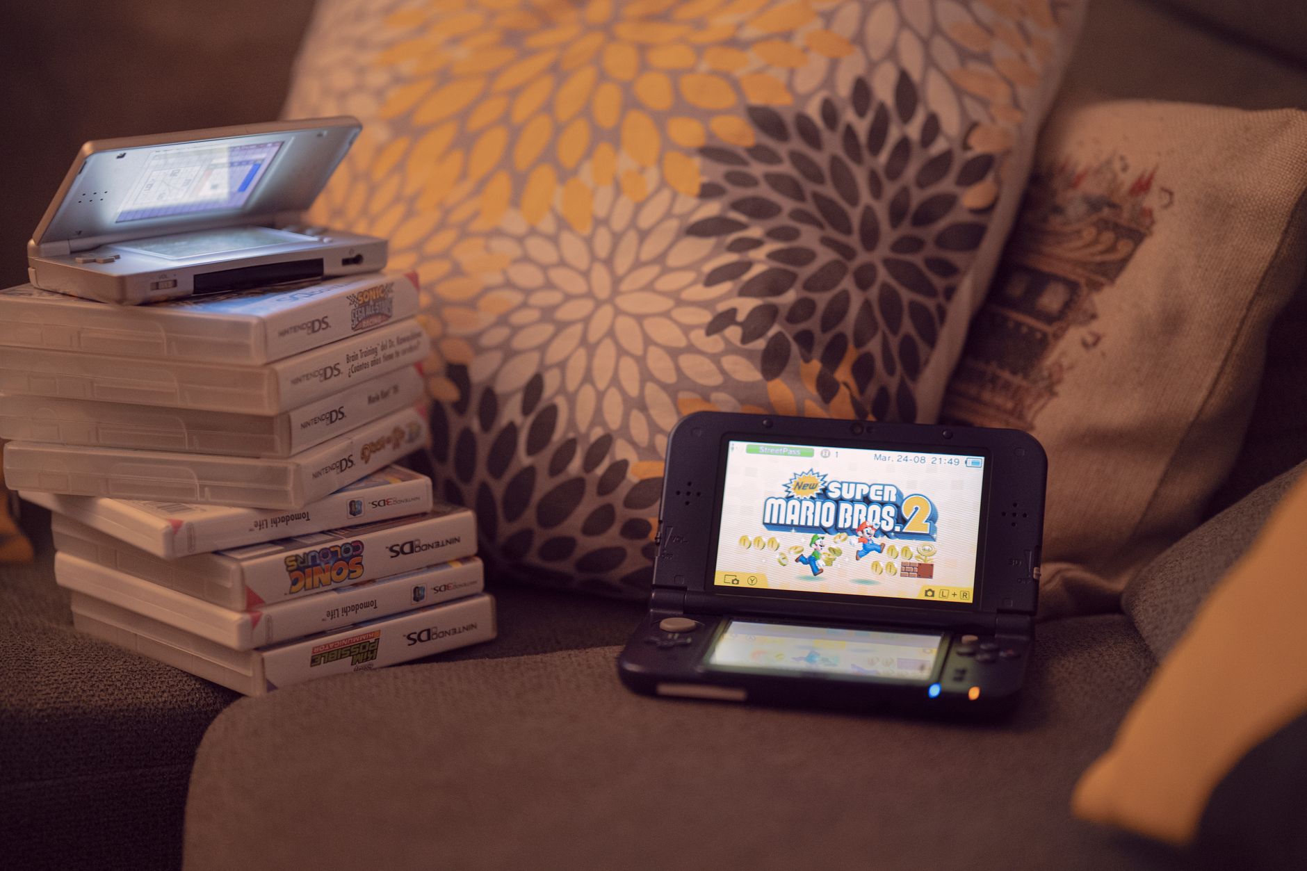 A Nintendo gaming display setup showing colorful on-screen action in a game environment